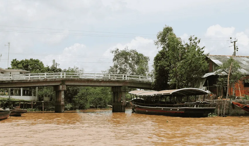 Boats on the Mekong River representing different cruise routes and packages