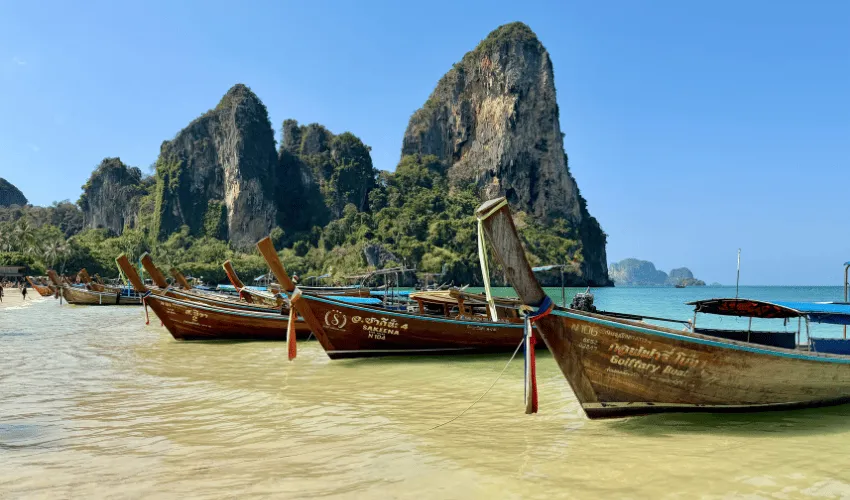 Traditional longtail boats at Railay Beach in Krabi Thailand