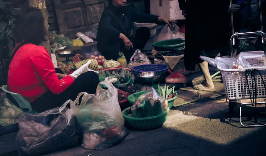Local market and cultural life in Hanoi on an Indochina journey