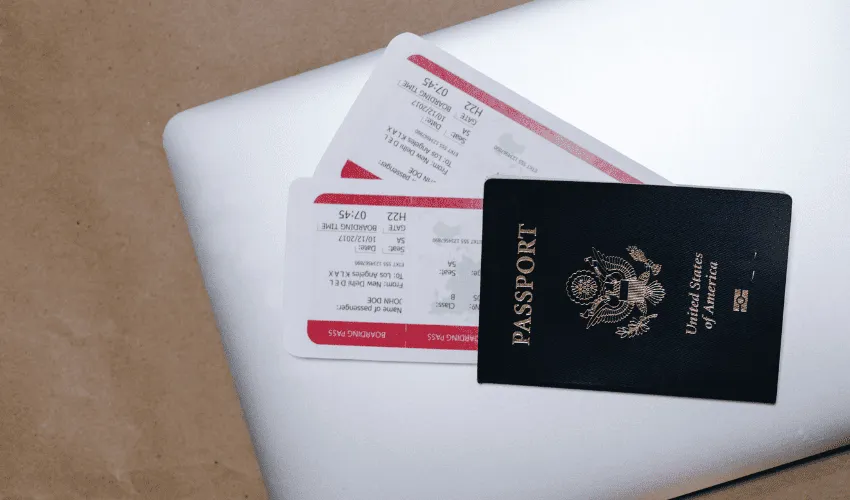 Passport and flight tickets for booking an Indochina vacation package