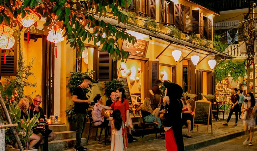 Vietnam culinary tour at a traditional street food stall in Hoi An